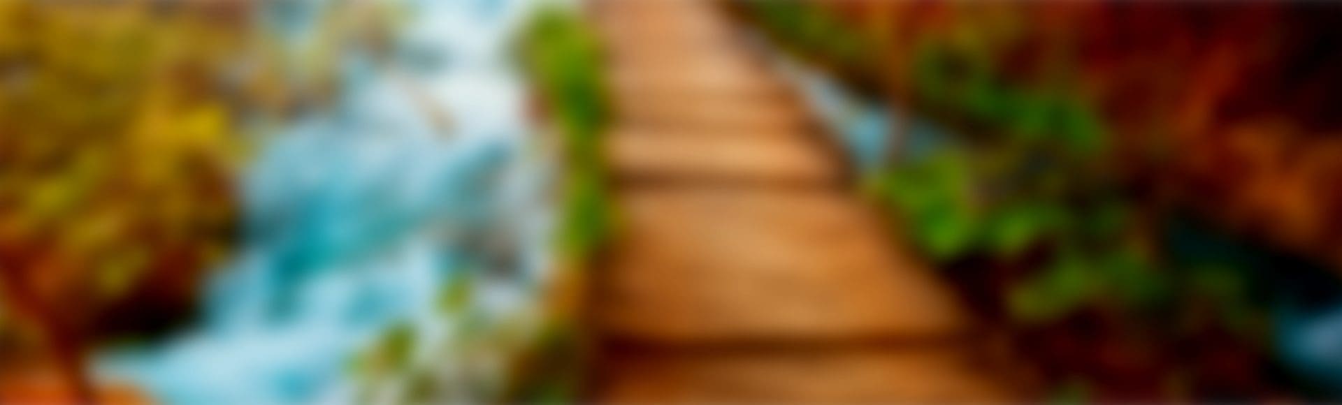 A blurry image of stairs with green plants growing on them.